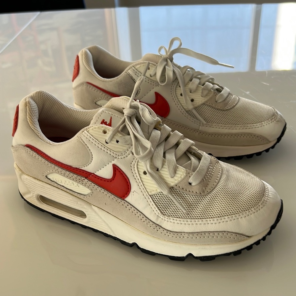 Nike Air Max 90 sneakers in white with orange accents